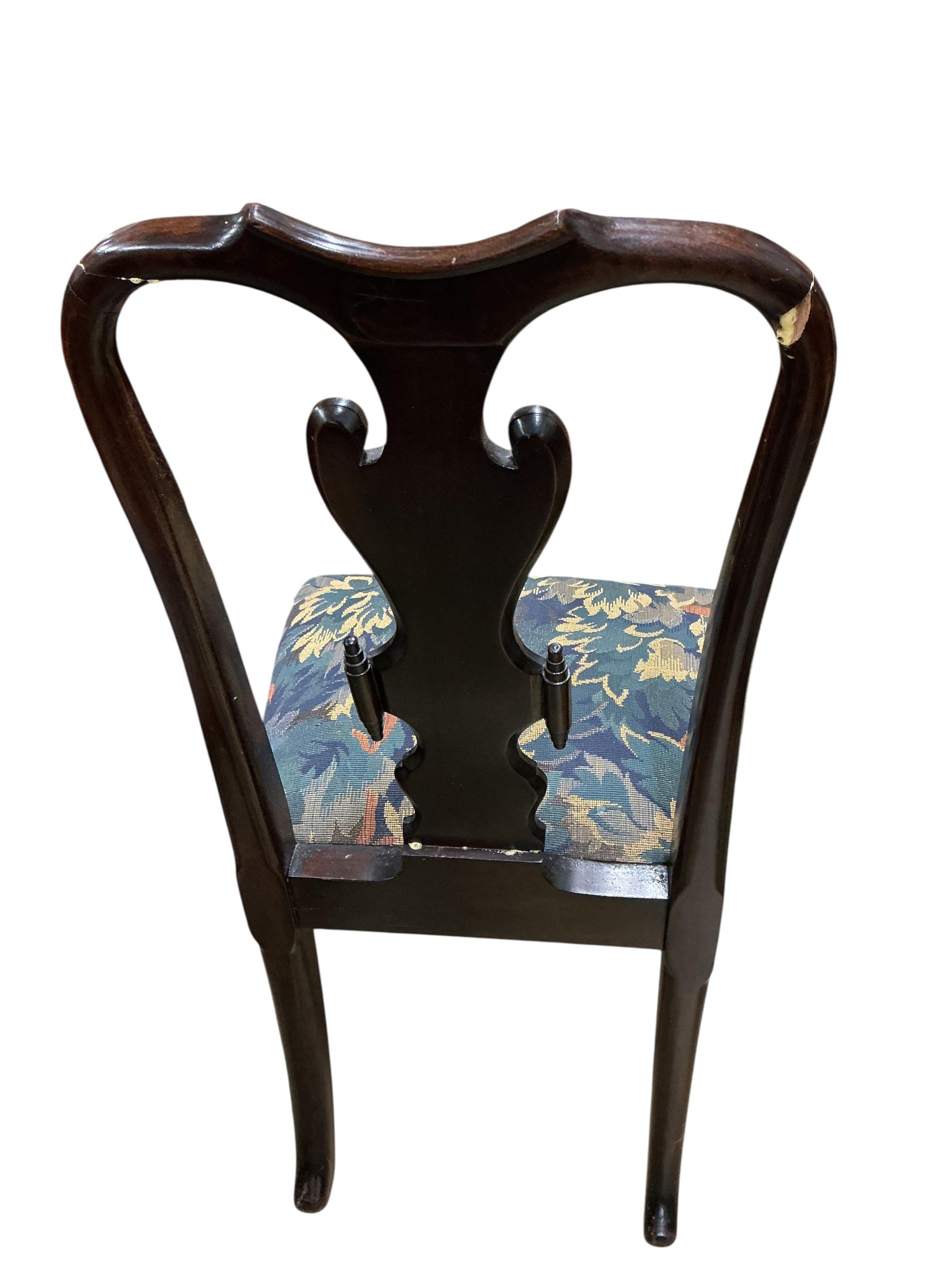 A set of six Queen Anne style mahogany dining chairs